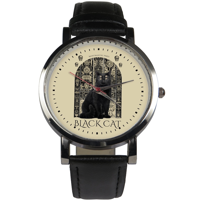May include: A black leather wristwatch with a silver face and black cat design. The watch face features a black cat sitting in front of a detailed, ornate doorway with the text "BLACK CAT" below the cat. The watch face also includes the text "MONTMARTRE PARIS" at the top.