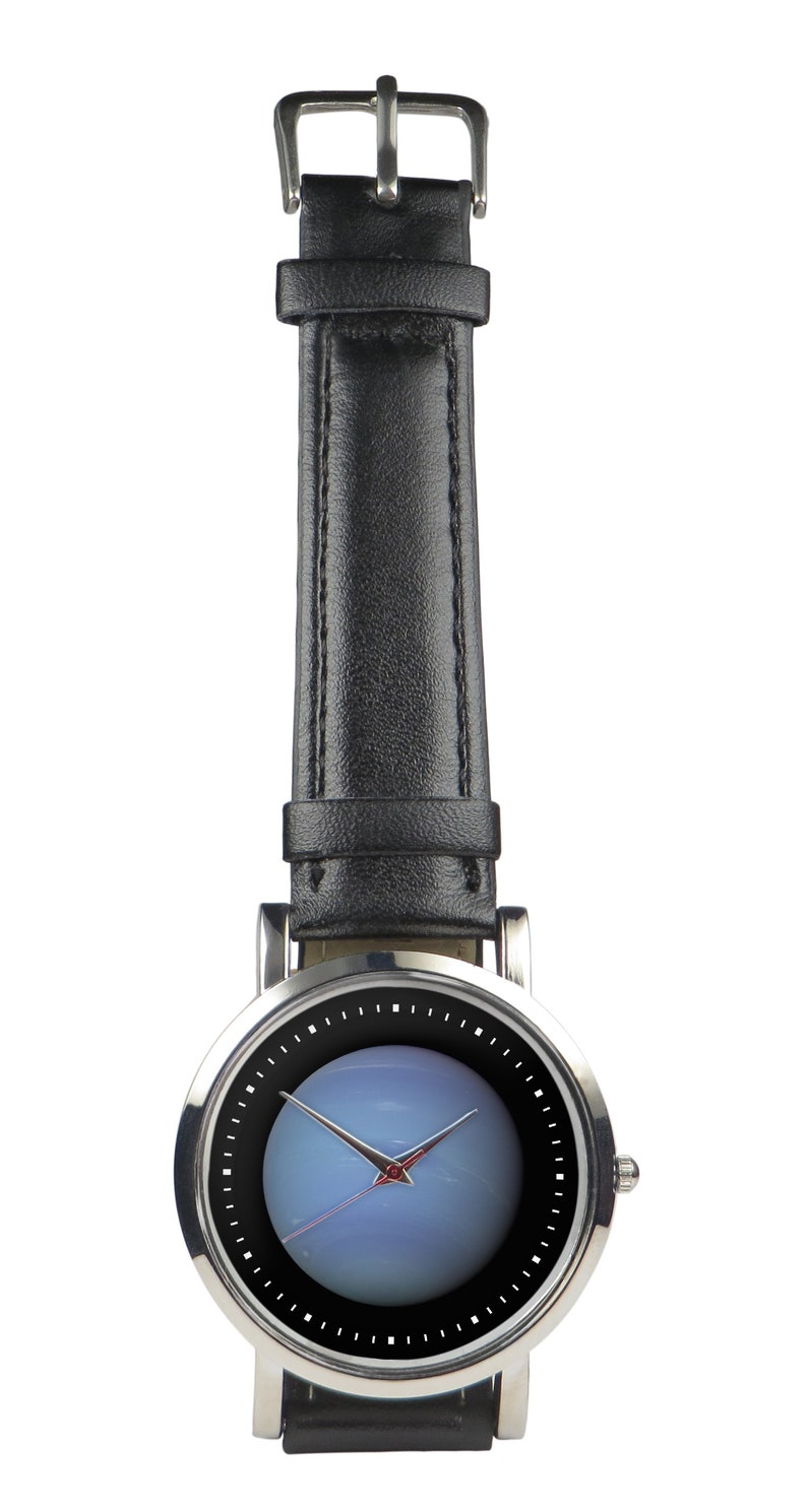 May include: A silver wristwatch with a black leather strap and a blue face. The watch has a silver case and a silver buckle.