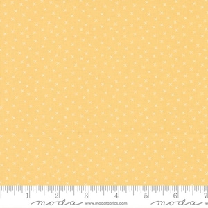 May include: A yellow fabric with a white x pattern. The fabric is a quilting cotton and is perfect for crafting projects.
