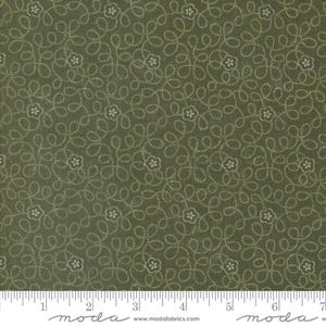 May include: Green fabric with a white floral pattern. The pattern is a repeating design of small flowers and vines.