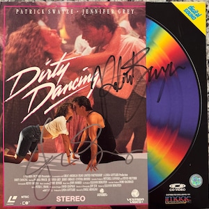 Patrick Swayze and Jennifer Grey Original Autographed “Dirty Dancing” Laser Disc Cover (COA)