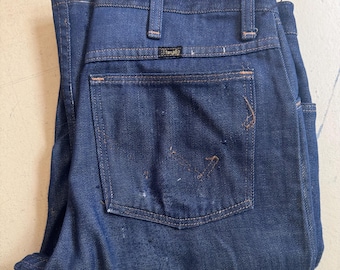 1970s Wrangler Dark Denim Boot cut Jeans, 30x33, distressed/broken in