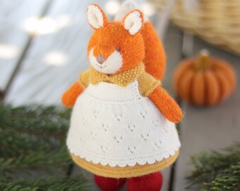 Knitted stuffed squirrel in a yellow dress and white pinafore - Handmade little squirrel woodland toy