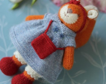 Knitted little squirrel toy in a blue embroidered dress - Knitted stuffed squirrel animal dressed toy for baby shower, girl birthday gift