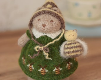 Knitted bear toy in a green dress with bees - handmade woodland animal toy for baby shower or girl birthday gift