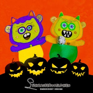 May include: Two plush monster figures with green faces, purple and yellow bodies, and embroidered details. Below are four black jack-o'-lanterns with glowing yellow eyes and mouths. The background is orange. The text "Stickzauberwaeldchen Embroidery Design" is at the bottom.