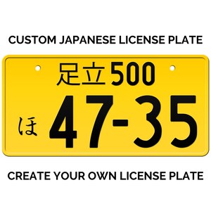 May include: A yellow Japanese number plate with black text. The plate reads "定置 500" and "は 47-35".