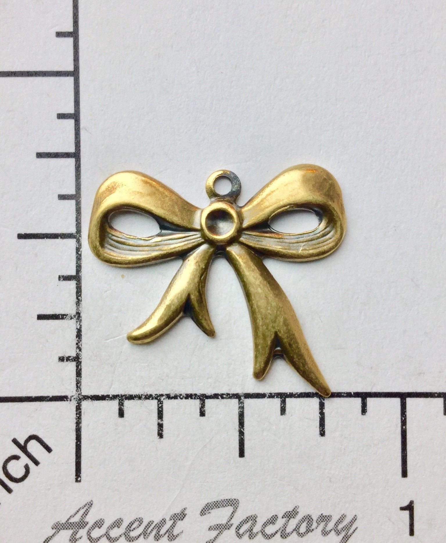 28963          12 Pc  Brass Oxidized Small Modern Bow Jewelry Finding  SALE 