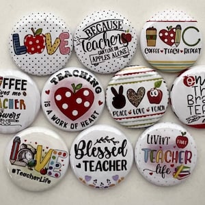 May include: Ten round white buttons with colorful designs and text related to teaching. The text includes "Love", "Because Teachers", "Coffee Gives Me Teacher Powers", "Teaching is a Work of Heart", "Peace Love Teach", "Only the Brave Teach", "Blessed Teacher", "Livin' That Teacher Life", "Coffee Teach Repeat" and "#TeacherLife".