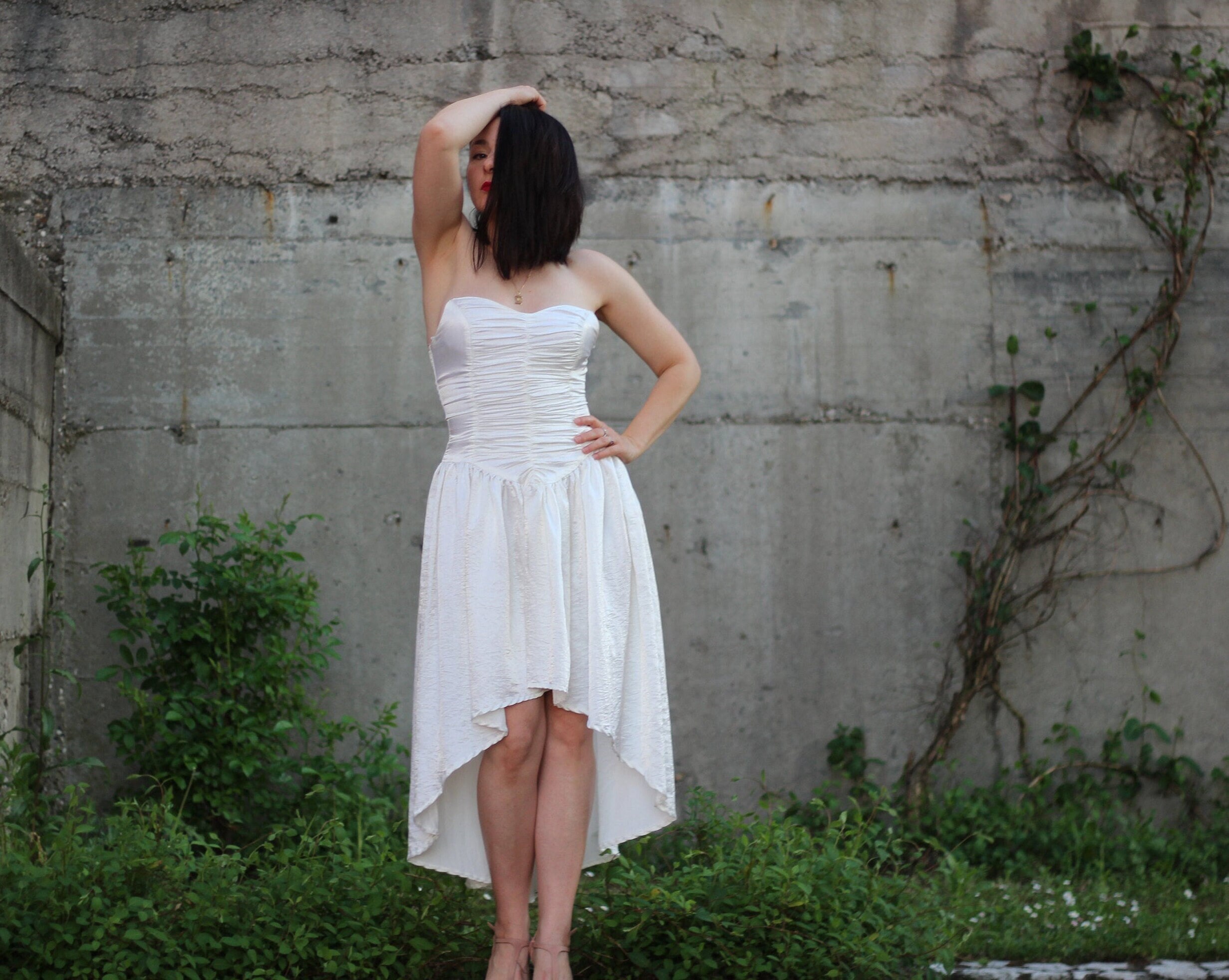 white asymmetrical hem dress