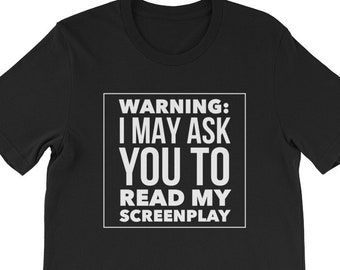 May include: Black t-shirt with white text that reads "WARNING: I MAY ASK YOU TO READ MY SCREENPLAY".