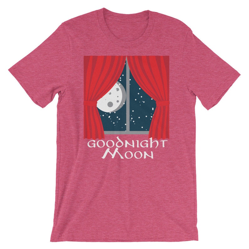 May include: A pink t-shirt with a graphic of a window with red curtains and a full moon in the night sky. The text "GOODNIGHT MOON" is printed below the window.