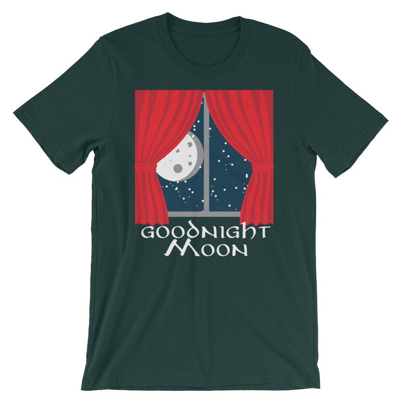 May include: A dark green t-shirt with a red curtain window design. The window shows a crescent moon and stars in a night sky. The text "Goodnight Moon" is printed below the window.