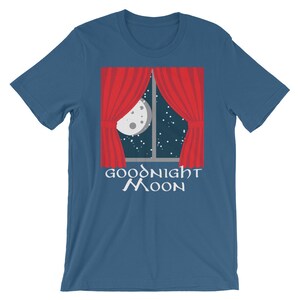 May include: A blue t-shirt with a red window with white curtains and a moon and stars in the window. The text "Goodnight Moon" is printed below the window.