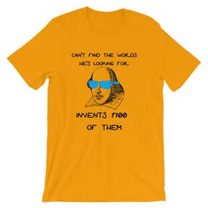 May include: A yellow t-shirt with a black and white illustration of William Shakespeare wearing blue sunglasses. The text on the shirt reads "Can't find the words he's looking for. Invents 1700 of them."
