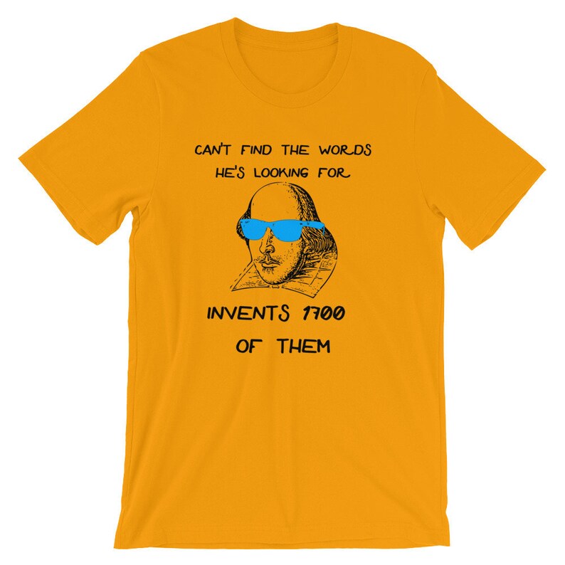 May include: A yellow t-shirt with a black and white illustration of William Shakespeare wearing blue sunglasses. The text on the shirt reads "Can't find the words he's looking for. Invents 1700 of them."