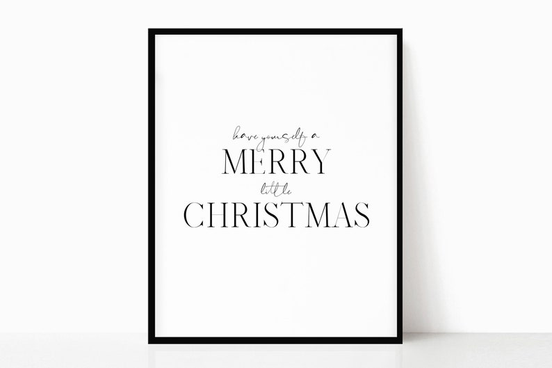 May include: Black and white printable wall art with the text "Have yourself a merry little Christmas".