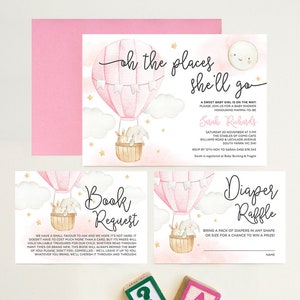 May include: A pink and white baby shower invitation with a hot air balloon illustration. The invitation includes the text "oh the places she'll go" and details about the event, including the date, time, and location. There is also a separate card for a book request and a diaper raffle.