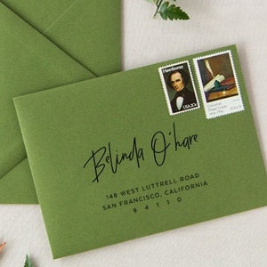 May include: Green envelope with a white address label that reads "Belinda O'hare, 148 West Luttrell Road, San Francisco, California 94110". The envelope has two postage stamps with images of historical figures.