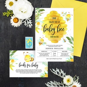 May include: Baby shower invitation set with a bee theme. The invitation features a yellow and gold honeycomb design with the text "The Sweetest Baby Bee Shower." Includes a matching card for books for baby and a yellow envelope.