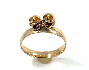 Bague deux têtes de mort en or jaune massif 14 carats (taille 7,5)