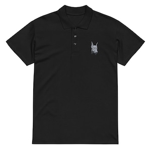 May include: Black polo shirt with a white embroidered image of a Doberman Pinscher's head.