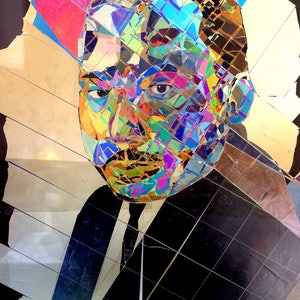 May include: A colorful mosaic portrait of a man with a black suit and a white shirt. The mosaic is made of small pieces of glass and plastic in various colors, including blue, green, red, and yellow.