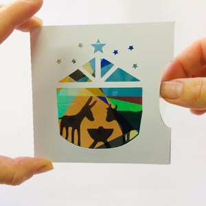 Tarjeta caleidoscopio animada para niños, patrón de belén navideño para personalizar