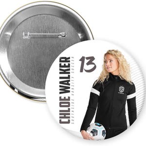 May include: A white button with black text that reads "CHLOE WALKER SOUTHSIDE VARSITY SOCCER" and the number "13". A woman wearing a black and white soccer uniform is holding a soccer ball.