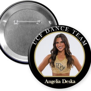 May include: A circular pinback button featuring a photograph of a dancer wearing a gold sequined top with the UCF logo. The black border displays the text UCF DANCE TEAM at the top and the name Angelia Deska at the bottom in white lettering.