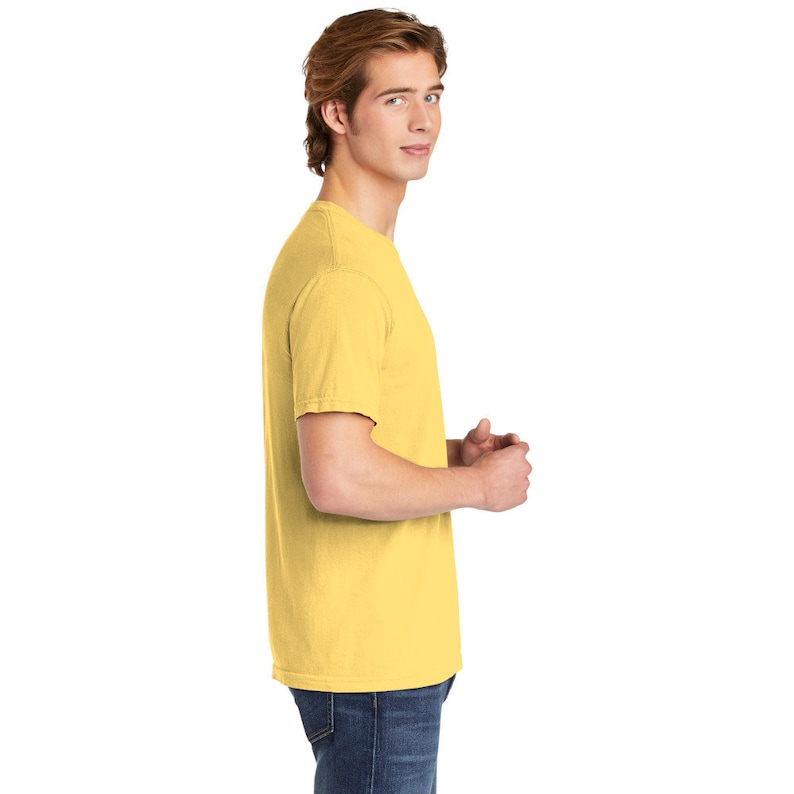 May include: A yellow short-sleeved t-shirt with a crew neck.