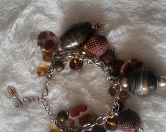 Charm bracelet brown/silvertone various beads
