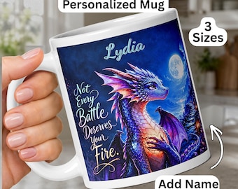 May include: A white ceramic mug featuring a blue and purple dragon illustration against a night sky with a full moon. The text reads Lydia and Not Every Battle Deserves Your Fire. The mug includes labels for Blue Glow Dragon Personalized Mug.