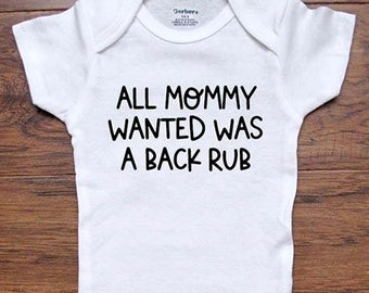 May include: White baby onesie with black text that reads "All Mommy Wanted Was A Back Rub".