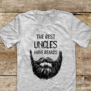 May include: Gray t-shirt with the text "The Best Uncles Have Beards" and a black and white illustration of a beard.