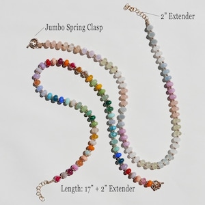 May include: Two beaded necklaces with a rainbow color scheme. One necklace is 17 inches long with a 2-inch extender, and the other is shorter. Both necklaces have a jumbo spring clasp. The beads are in shades of pink, orange, yellow, green, blue, and purple.