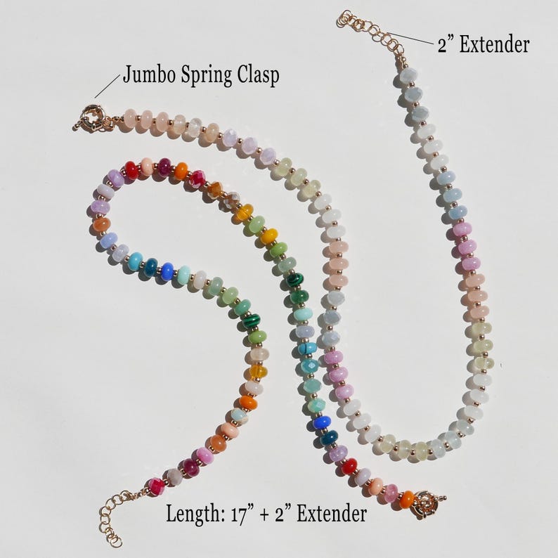 May include: Two beaded necklaces with a rainbow color scheme. One necklace is 17 inches long with a 2-inch extender, and the other is shorter. Both necklaces have a jumbo spring clasp. The beads are in shades of pink, orange, yellow, green, blue, and purple.