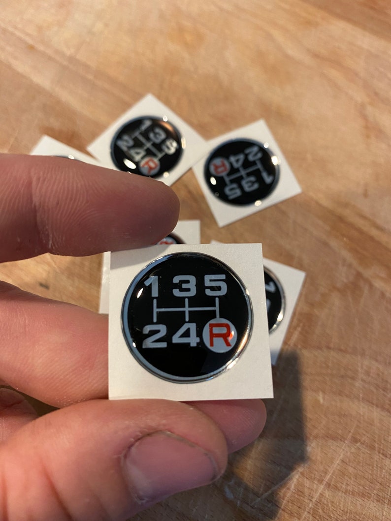 Black 1516\u201d shift emblem