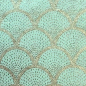Handmade paper mint with gold gift wrapping paper