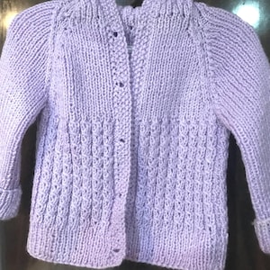 Baby hand knit sweater with hood in different colors and sizes
