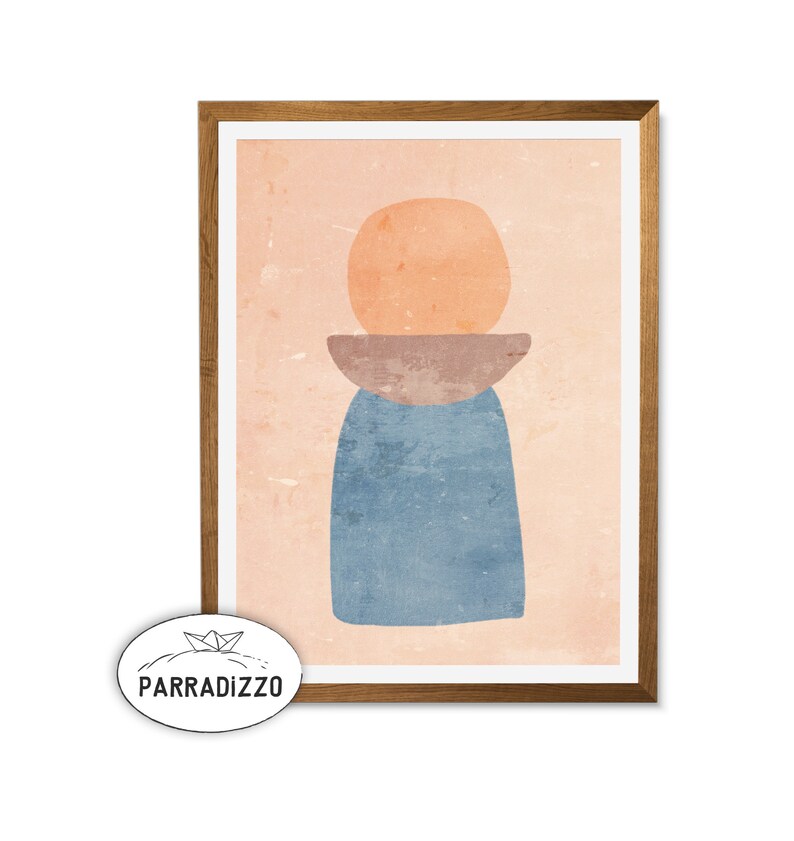 May include: Abstract art print with a peach colored circle, a brown bowl, and a blue vase on a pink background. The print is framed in a light brown wood frame.