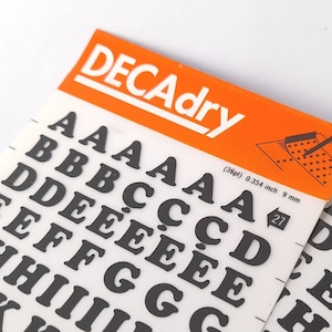 Vintage Set of Two Instant Rub on Letter Transfers from Decadry. Vintage Letters Stencil. Vintage Graphic Design.