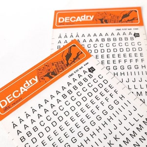 Vintage Set of Two Instant Rub on Letter Transfers from Decadry. Vintage Letters Stencil. Vintage Graphic Design.