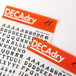 Vintage Set of Two Instant Rub on Letter Transfers from Decadry. Vintage Letters Stencil. Vintage Graphic Design.