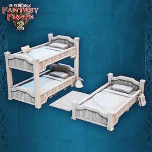 May include: 3D-printed fantasy props, including a bunk bed and a single bed, both with white bedding and pillows. A small rug and a bedside lamp are also included. The text "3D Printable Fantasy Props 2" is visible in the upper left corner.