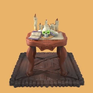 May include: A wooden table with a skull, candles, and a book on top. The table is on a dark brown rug with a decorative border.