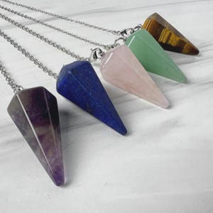 Crystal pendulum: healing energy tool for divination and dowsing