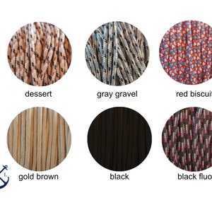 May include: Close-up of ten different colors of paracord, including dessert, gray gravel, red biscuit, gold brown, black, black fluo. Each color is shown in a circle.