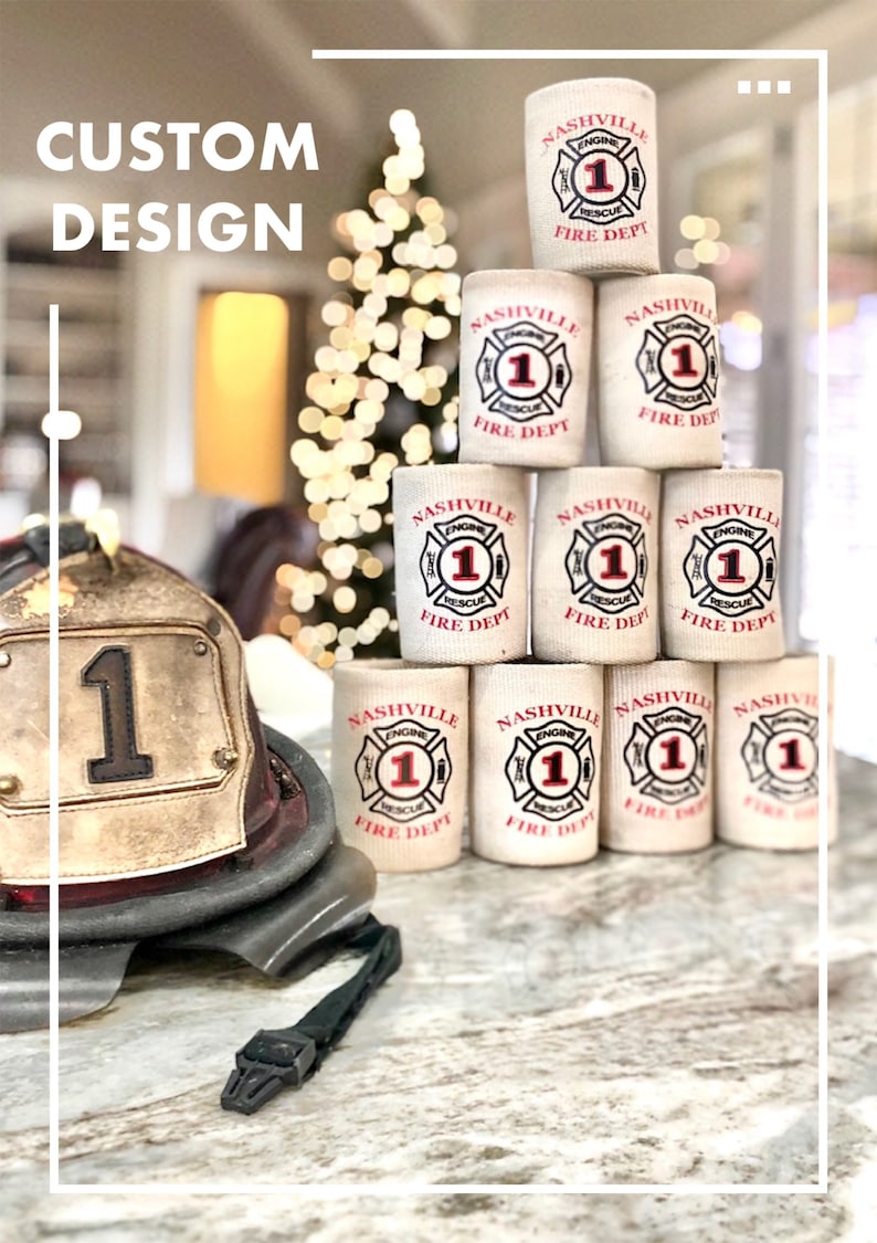 May include: A stack of 10 white can coolers with a red and black Nashville Fire Department logo. The logo features the words "Nashville Fire Dept" and "Engine 1 Rescue".