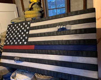 Fire Hose Flag with the thin red line and thin blue line. This combined thin red line flag & thin blue line flag is a great firefighter gift